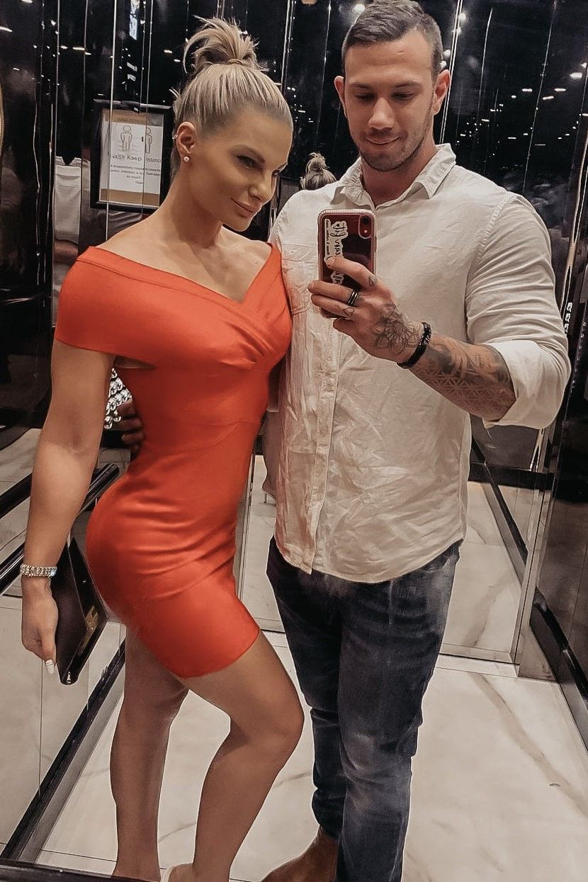 Woman wearing a figure flattering Bea Bandage Dress - Red Wine Bodycon Collection