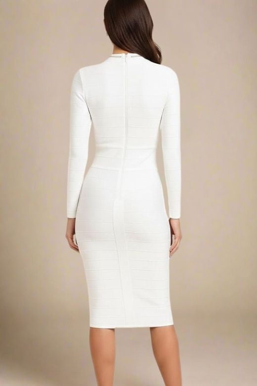 Woman wearing a figure flattering Brooke Long Sleeve Bandage Dress - White Pearl BODYCON COLLECTION