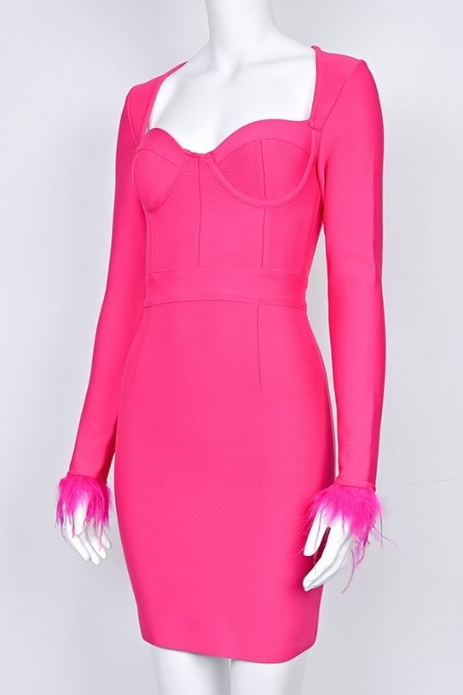 Woman wearing a figure flattering Erin Long Sleeve Bandage Mini Dress - Hot Pink BODYCON COLLECTION