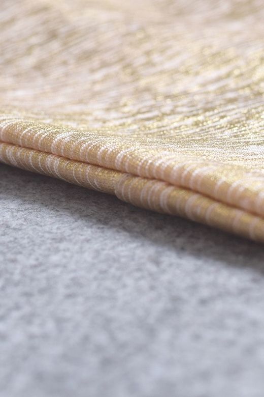 Woman wearing a figure flattering Jay High Waist Bandage Mini Skirt - Gold BODYCON COLLECTION