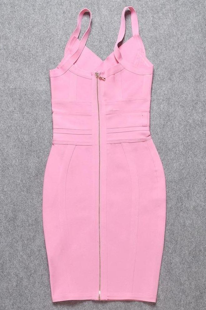 Woman wearing a figure flattering Kit Bandage Dress - Blush Pink Bodycon Collection