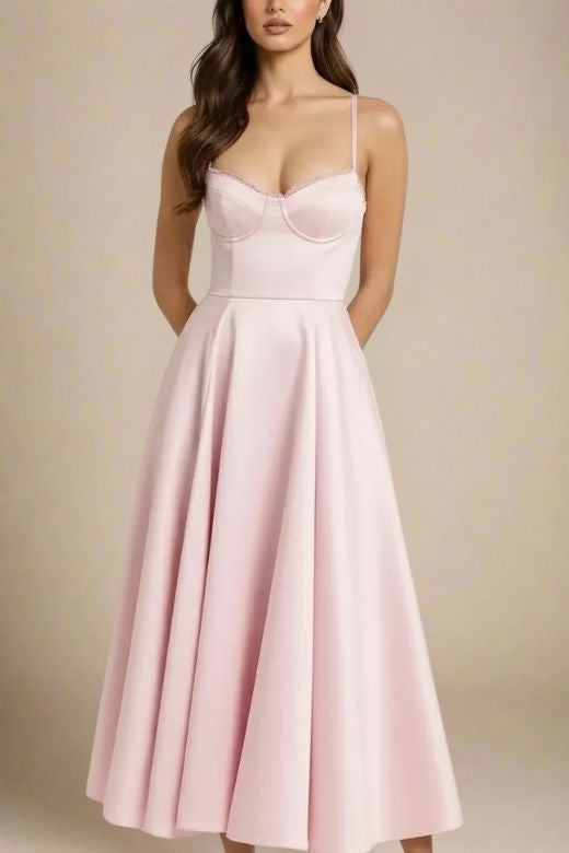 Woman wearing a figure flattering Mavis Bodycon Midi Dress - Dusty Pink BODYCON COLLECTION