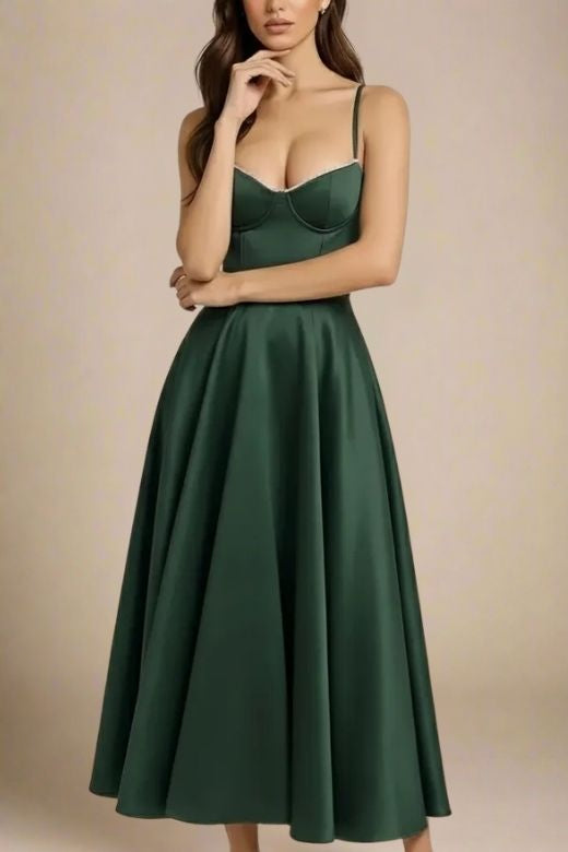 Woman wearing a figure flattering Mavis Bodycon Midi Dress - Emerald Green BODYCON COLLECTION
