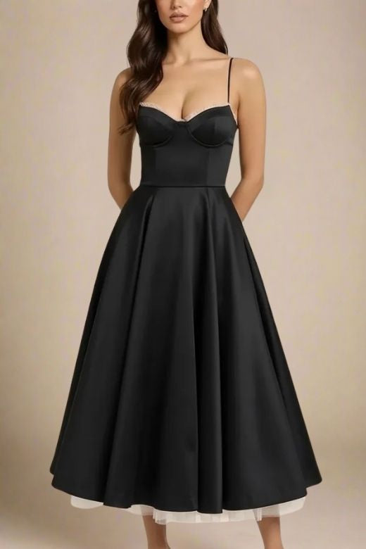 Woman wearing a figure flattering Mavis Midi Dress - Classic Black BODYCON COLLECTION