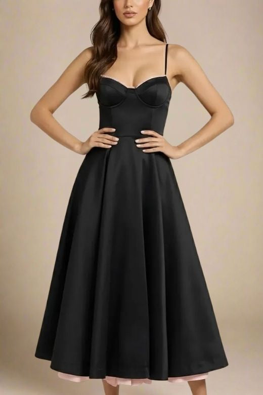 Woman wearing a figure flattering Mavis Midi Dress - Classic Black BODYCON COLLECTION