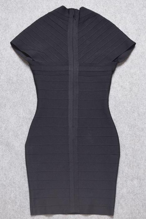 Woman wearing a figure flattering Miranda Bandage Mini Dress - Classic Black Bodycon Collection