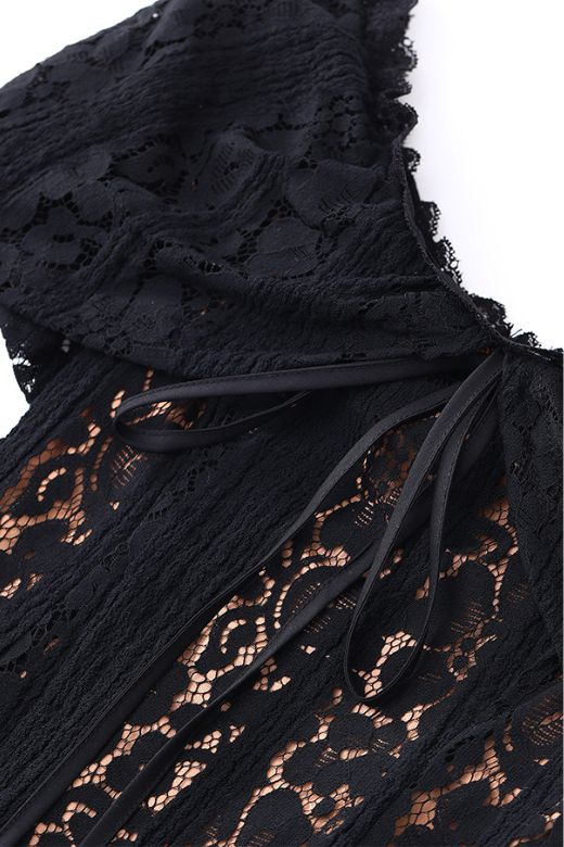 Woman wearing a figure flattering Rose Long Sleeve Bodycon Mini Dress - Classic Black BODYCON COLLECTION