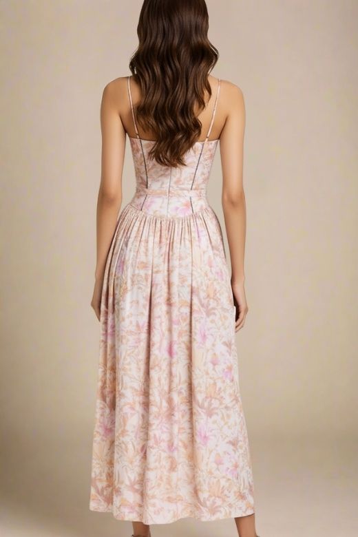 Woman wearing a figure flattering Tasmin Midi Dress - Pink Print BODYCON COLLECTION