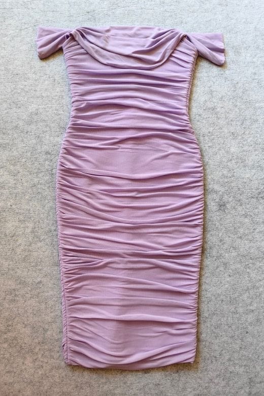 Woman wearing a figure flattering Zia Bodycon Wrap Midi Dress - Violet Purple Bodycon Collection