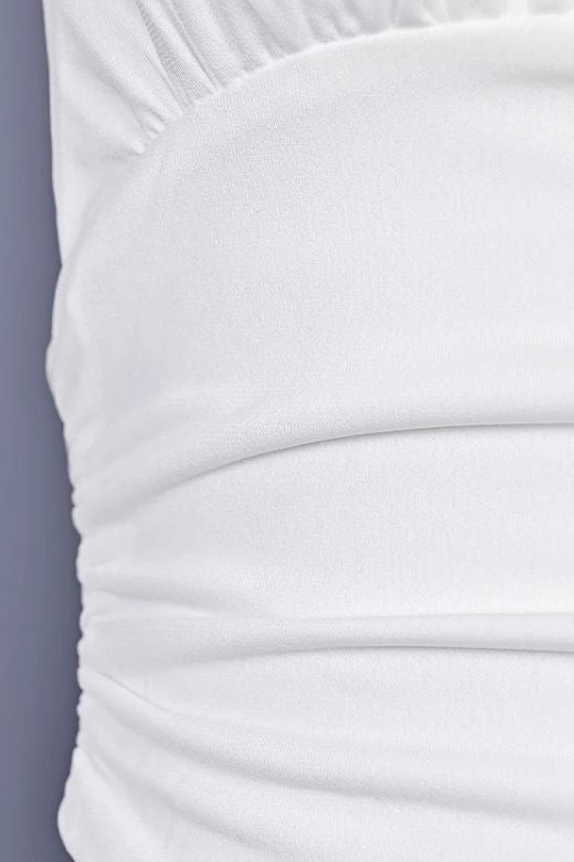 Woman wearing a figure flattering  Aby Halter Top - White Pearl BODYCON COLLECTION Pty Ltd