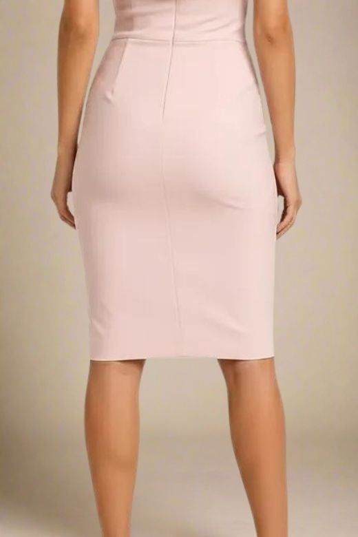 Woman wearing a figure flattering  Bea Bandage Dress - Cream Bodycon Collection