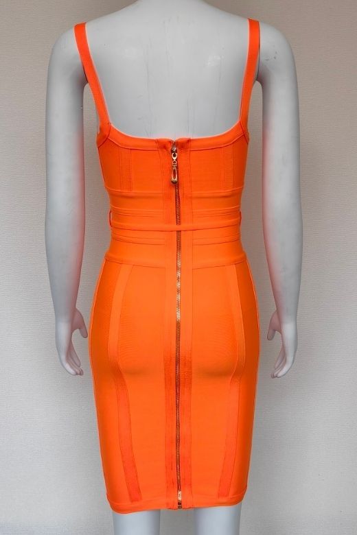 Woman wearing a figure flattering  Bek Bandage Dress - Apricot Orange Bodycon Collection