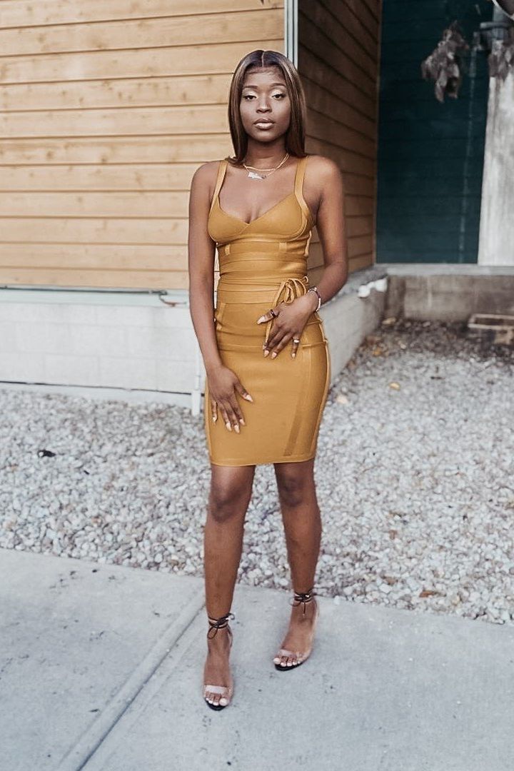 Woman wearing a figure flattering  Bek Bandage Dress - Cream Bodycon Collection