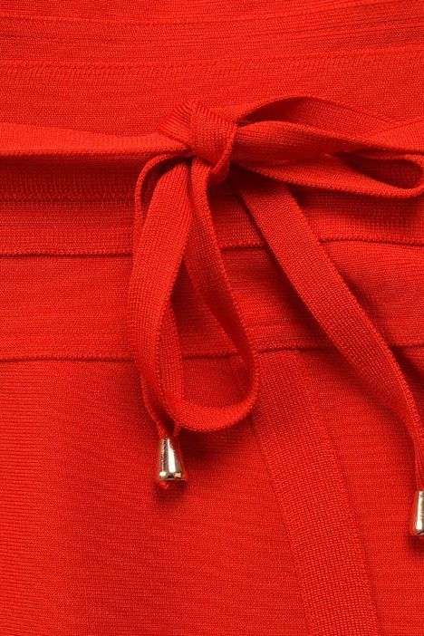 Woman wearing a figure flattering  Bek Bandage Dress - Lipstick Red Bodycon Collection