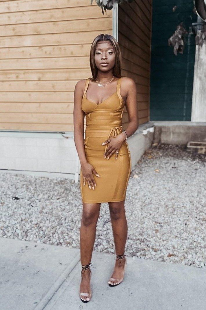 Woman wearing a figure flattering  Bek Bandage Dress - Mustard Yellow Bodycon Collection
