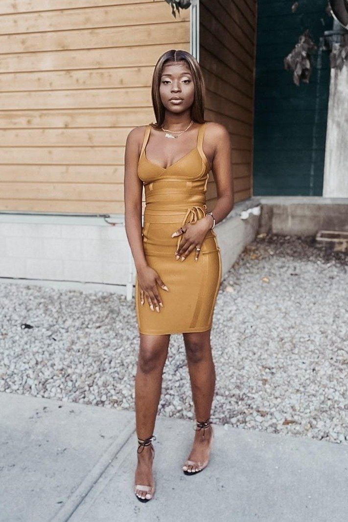 Woman wearing a figure flattering  Bek Bandage Dress - Plum Purple Bodycon Collection