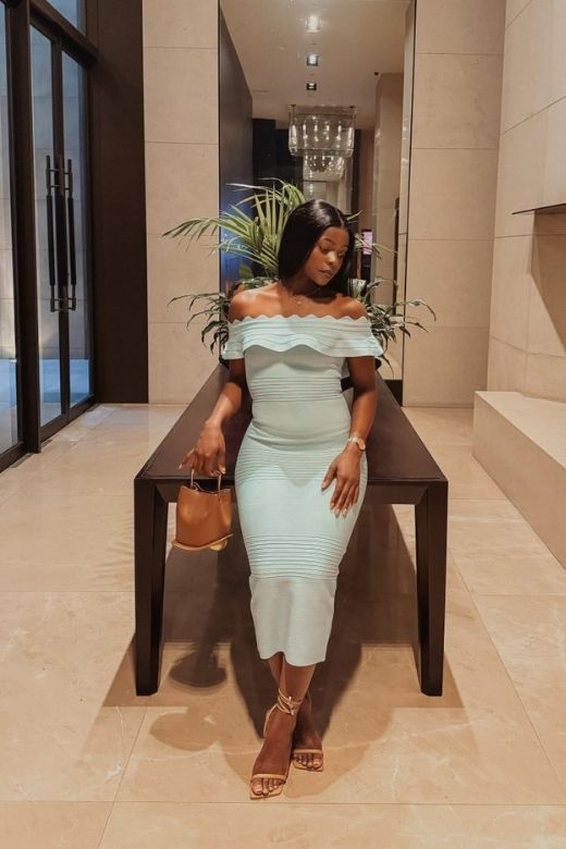 Woman wearing a figure flattering  Billie Bandage Midi Dress - Mint Green Bodycon Collection