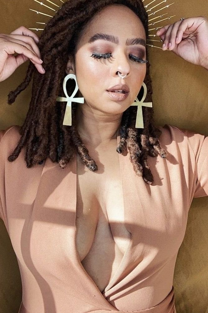 Woman wearing a figure flattering  Blaire Long Sleeve Bandage Dress - Tan Brown BODYCON COLLECTION