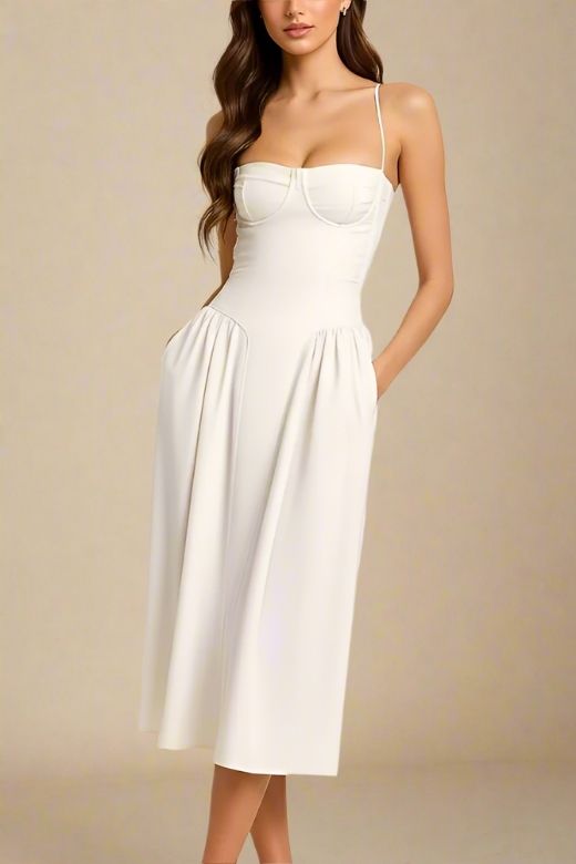 Woman wearing a figure flattering  Everly Midi Dress - White Pearl BODYCON COLLECTION