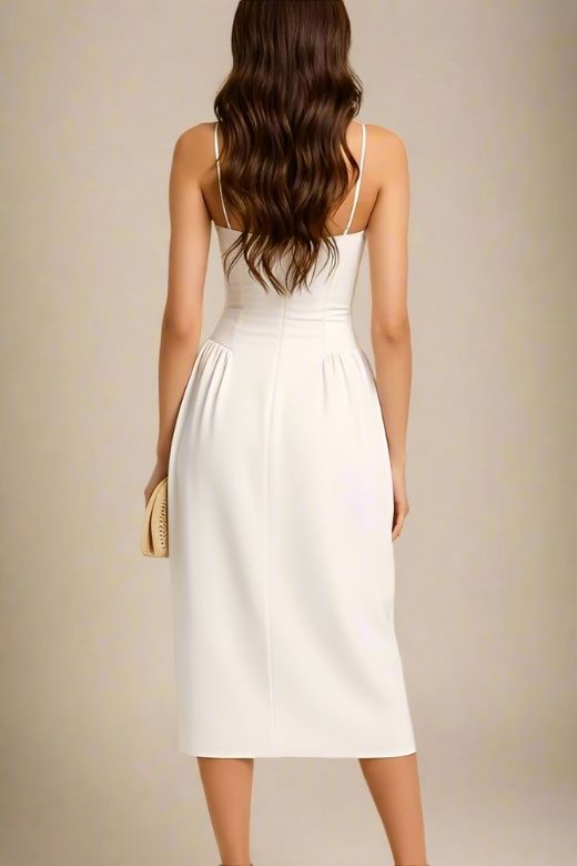 Woman wearing a figure flattering  Everly Midi Dress - White Pearl BODYCON COLLECTION