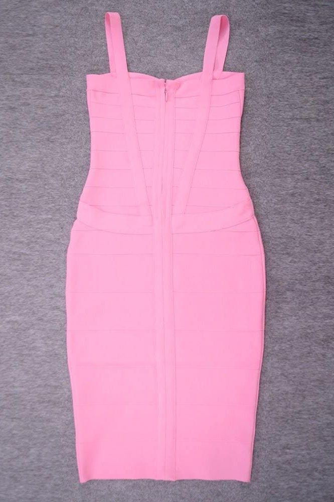 Woman wearing a figure flattering  Heidi Bandage Midi Dress - Dusty Pink Bodycon Collection