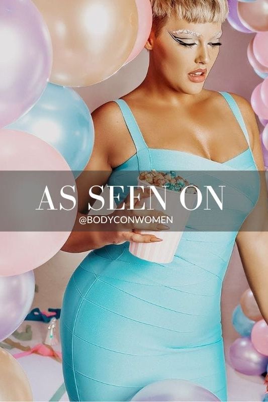 Woman wearing a figure flattering  Heidi Bandage Midi Dress - Sky Blue Bodycon Collection