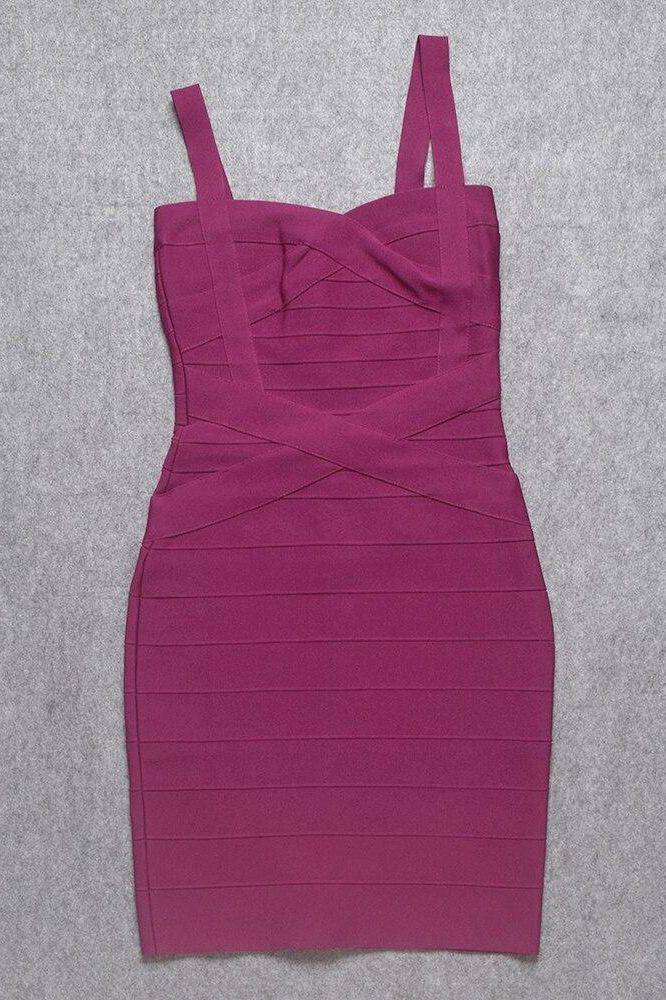 Woman wearing a figure flattering  Heidi Bandage Mini Dress - Magenta Pink Bodycon Collection