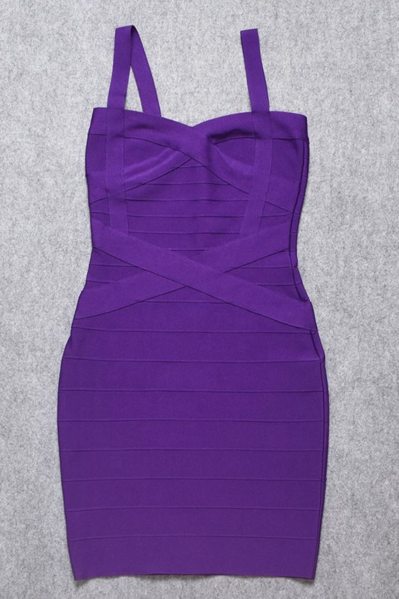 Woman wearing a figure flattering  Heidi Bandage Mini Dress - Plum Purple Bodycon Collection