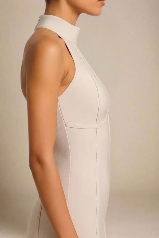 Woman wearing a figure flattering  Lea Bandage Midi Dress - Beige Bodycon Collection