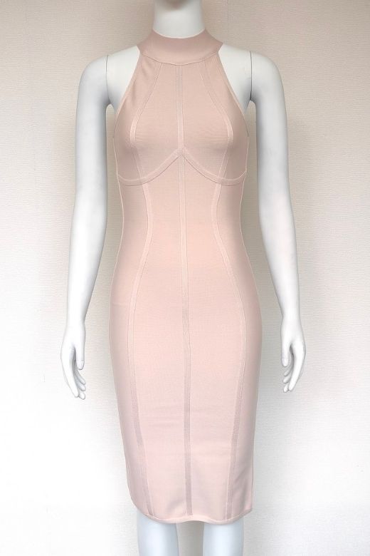Woman wearing a figure flattering  Lea Bandage Midi Dress - Beige Bodycon Collection