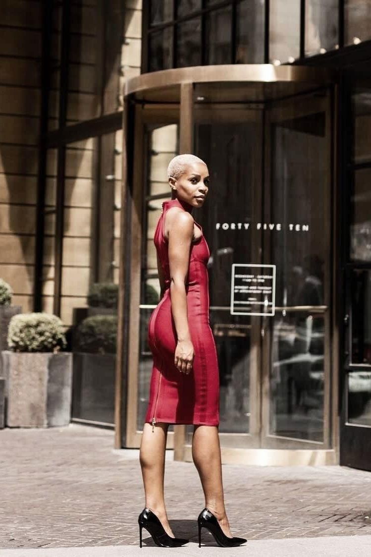 Woman wearing a figure flattering  Lea Bandage Midi Dress - Nude Bodycon Collection