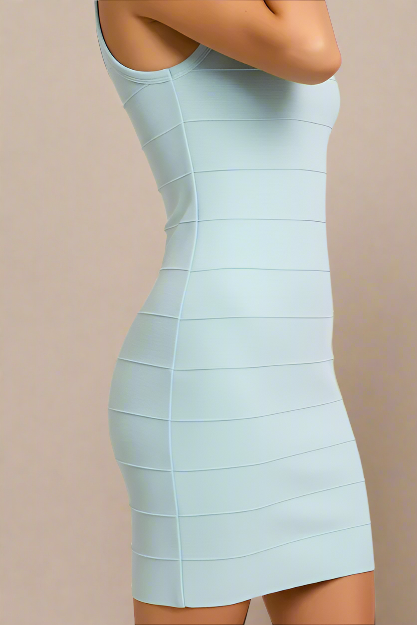 Woman wearing a figure flattering  Maria Bandage Mini Dress - Baby Blue BODYCON COLLECTION