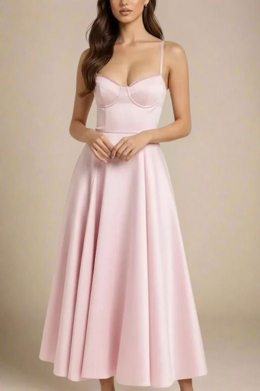 Woman wearing a figure flattering  Mavis Bodycon Midi Dress - Dusty Pink BODYCON COLLECTION