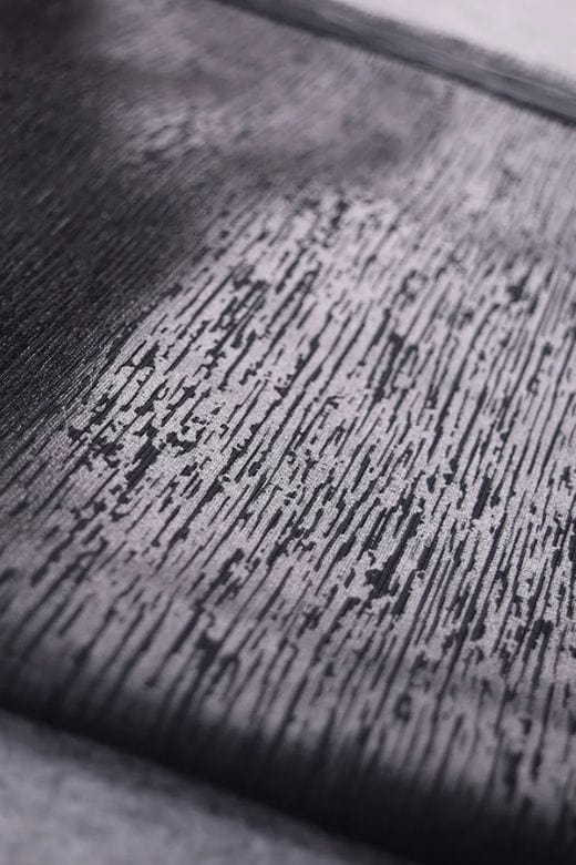 Woman wearing a figure flattering  Pencil High Waist Leather Metallic Midi Skirt - Classic Black BODYCON COLLECTION