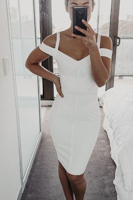 Woman wearing a figure flattering  Sophia Bandage Dress - Pearl White Bodycon Collection