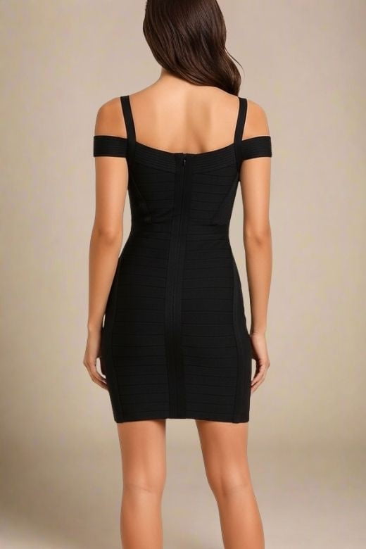Woman wearing a figure flattering  Sophia Bandage Mini Dress - Classic Black Bodycon Collection
