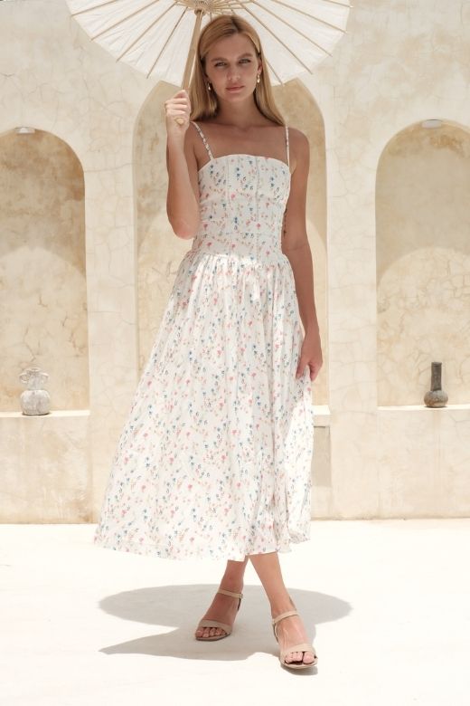 Woman wearing a figure flattering  Tasmin Midi Dress - White Pearl BODYCON COLLECTION